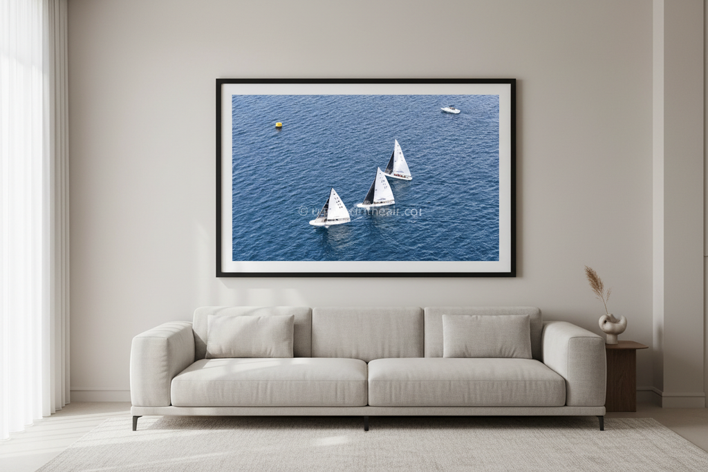 Sailing fine art print displayed in a modern living room