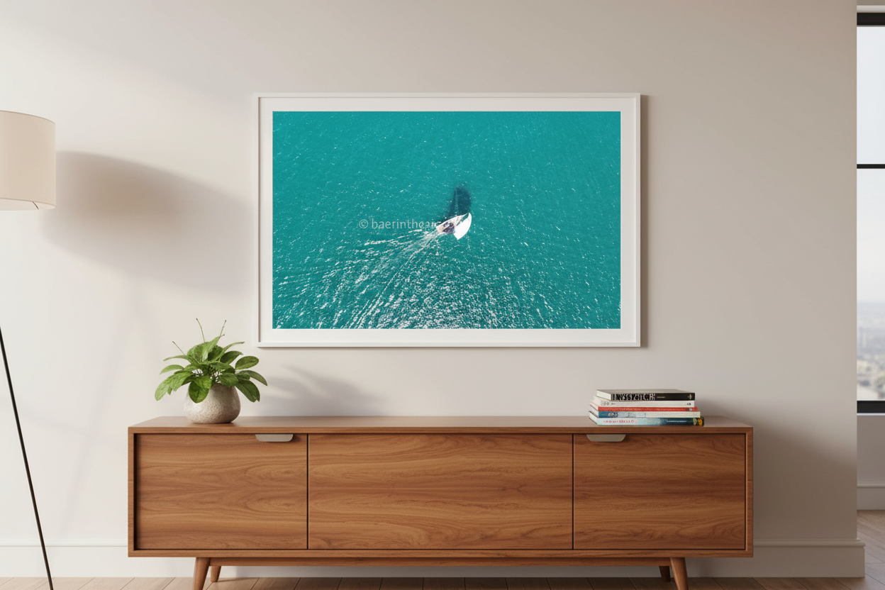 Chasing Wind fine art print displayed above a modern sideboard