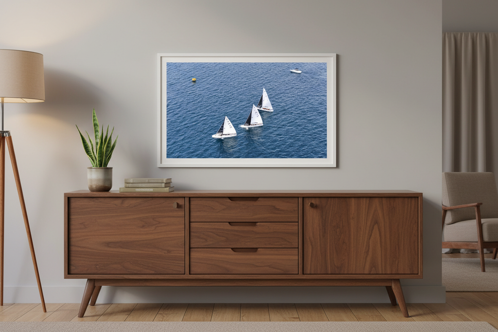 Sailing fine art print displayed above a modern sideboard